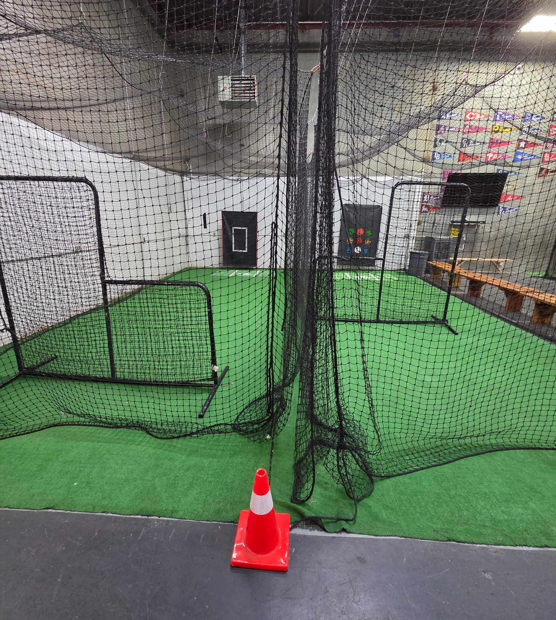 The two mini cages with netting and hitting screens